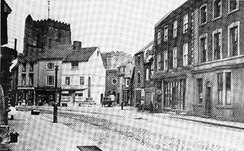 View of High Street northwards towards Butter Cross and houses backing onto St N...
